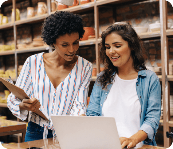 female business owners reviewing orders